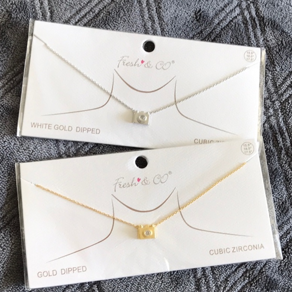 Fresh & Co Cubic Zirconia Camera Necklace

New in packaging as pictured